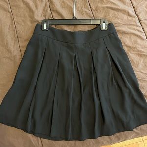 flowey black skirt, good for work and going out, banana republic size 4